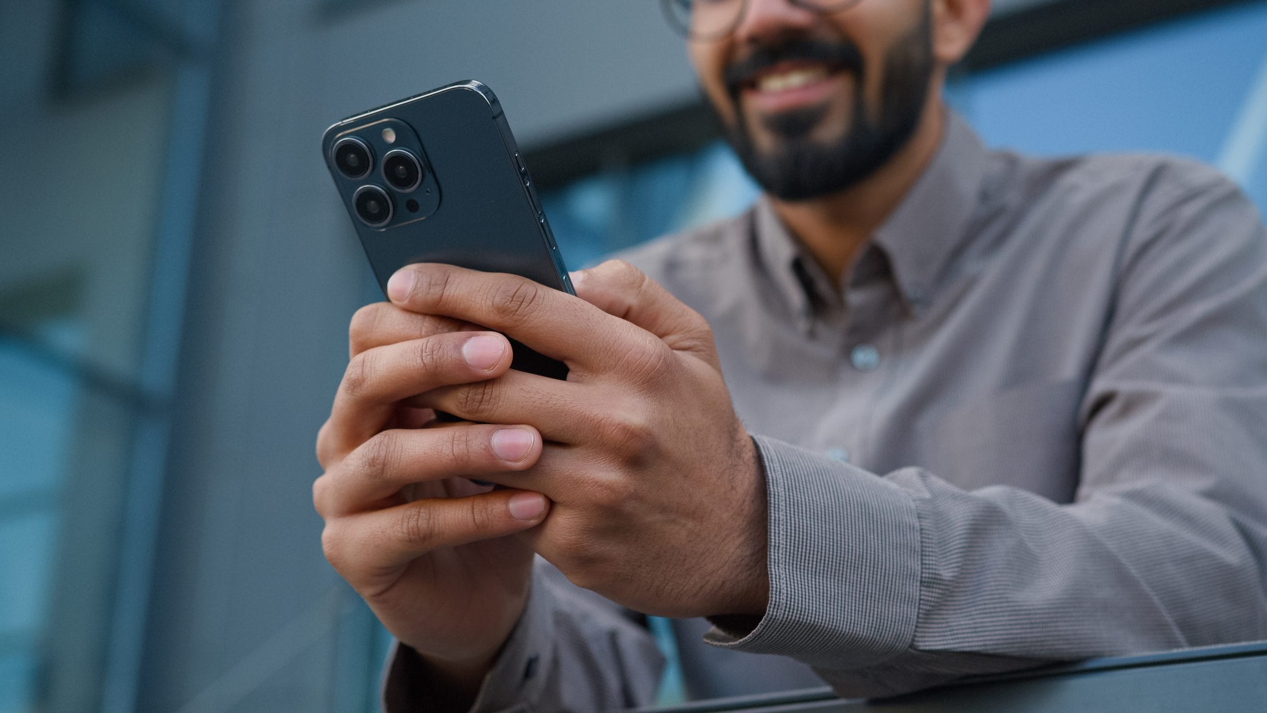 Person holding mobile phone